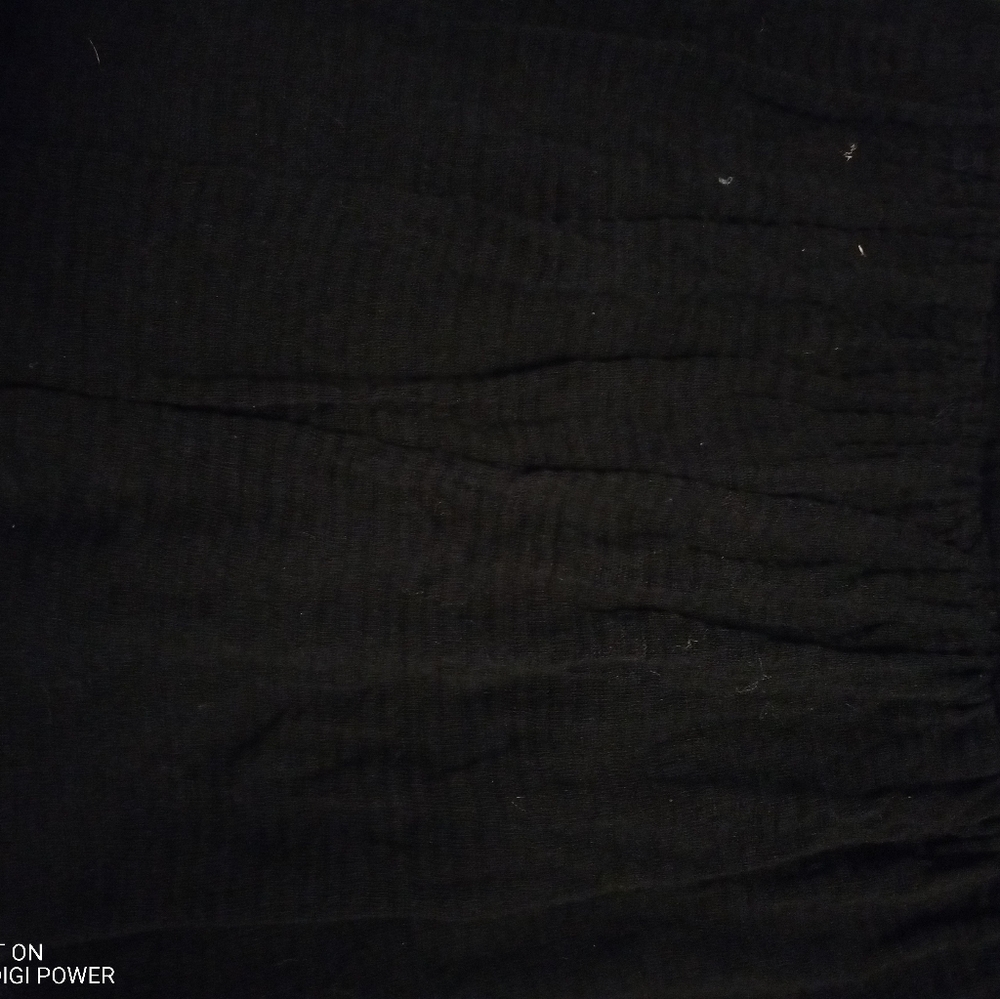 Black ruffle mini skirt